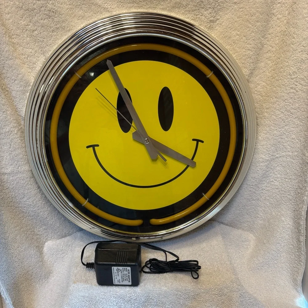 Smiley Face Neon Yellow Light Up Clock with Silver Chrome Frame